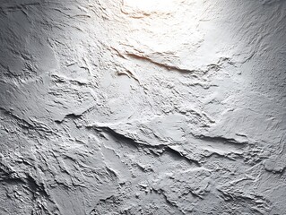 Blank textured plaster wall in a natural light studio environment.