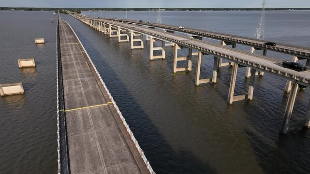 Traveling across America in cars and trucks driving across Lake Marion in South Carolina on Interstate 95 