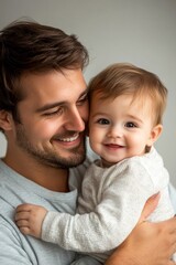 Portrait of dad playing with his son isolated on white