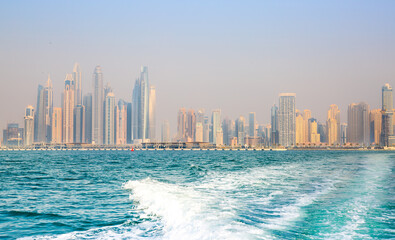 Obraz premium Dubai Marina skyscrapers and Dubai beach view from boat