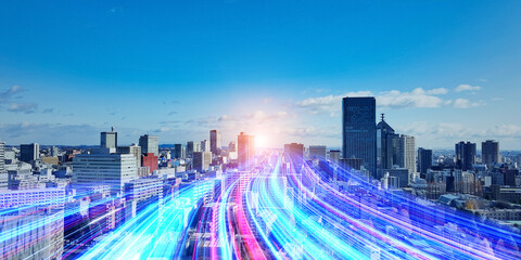 A light path to the future running through modern cities. Wide angle visual for banners or...