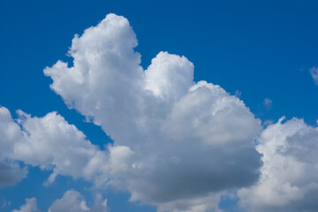closeup huge cumulus cloud on blue sky background