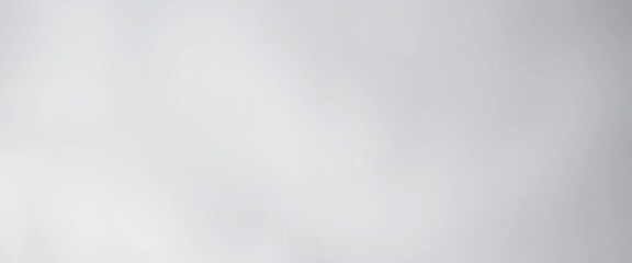 Obraz premium Light gray gradient backdrop, soft bokeh effect, ample copy space, design, advertising