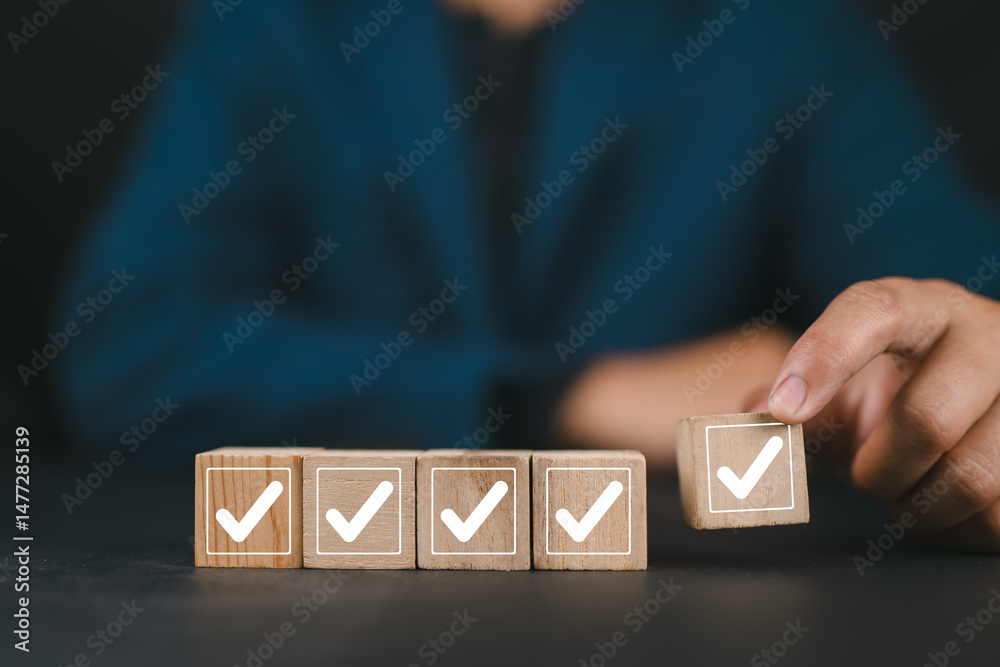 Fototapete Work Progress Loading Bar with Checklist. Man places a wooden block with a checkmark into a loading bar with 5 checkboxes, symbolizing progress, task completion, and project workflow development.