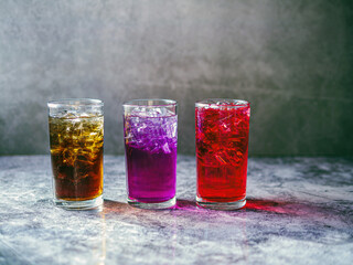 A lot of Soft drinks in colorful and flavorful glasses on the table,Glasses with sweet drinks with...