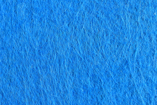 Textured drawing of an A4 sheet made of blue felt.