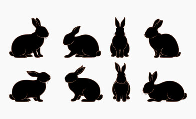 Set of Rabbit Silhouettes in Black, Displaying Multiple Stances of Sitting, Standing, and Hopping
