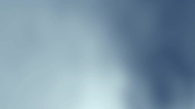 A soft blue abstract blur, evoking calmness and tranquility with no distinct shapes or objects in focus, Abstract texture Gradient motion Background.
