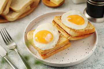 A croque madame sandwich, traditional dish of French cuisine