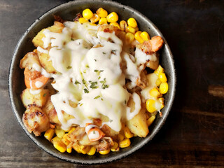 Hot Baked Corn and Potatoes with Cheese on the Stovetop