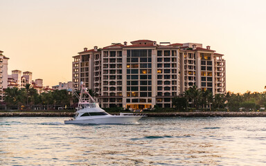 Yacht go to marina. Boating and yachting. Luxury lifestyle. Yacht at Fisher island luxury...