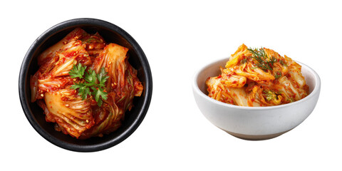 Two bowls of spicy, fermented kimchi garnished with herbs.