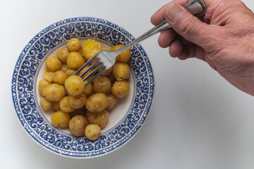 Boiled potatoes on a plate