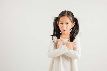 Portrait Asian young kid girl unhappy or confident standing holding two cross arms say no X sign,...