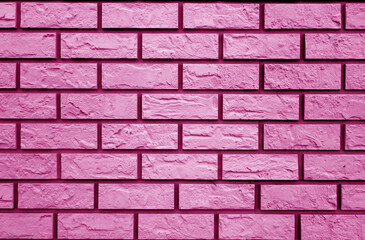 Decorative pink brick wall texture and pattern.