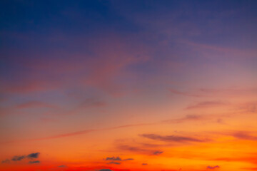 Fototapeta premium colorful clouds and sky,Dusk, Sunset Sky Clouds in the Evening with colorful Orange, Yellow, Pink and red sunlight and Dramatic storm clouds on Twilight sky, Landscape horizon