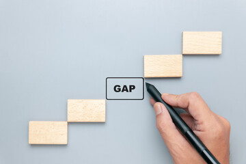 Hand drawing a square replace the missing pieces of wood in the pattern of a staircase, gap...