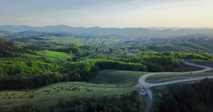 Aerial nature summer landscape flight over picturesque mountains forests meadows