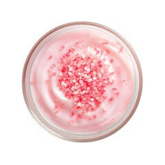 A top-down view of a clear glass bowl filled with a pink-tinted cream, swirled and topped with small pink salt crystals. The bowl is isolated on a white background
