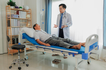 Elderly male patient consults a cardiologist after experiencing chest pain, seeking diagnosis and...