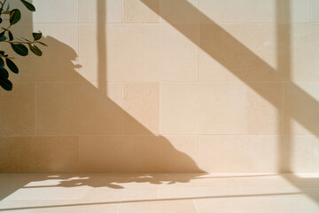 Sunlight creating shadows on tiled wall and floor