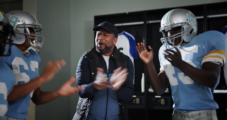 Applause, support and football with coach and team in locker room for game plan, sports and...