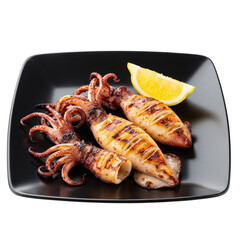 Grilled squid served on a sleek black plate with a lemon wedge, showcasing culinary art