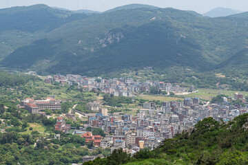 Fototapeta premium A small mountain town under the blue sky, Fuqing City, Fuzhou, China