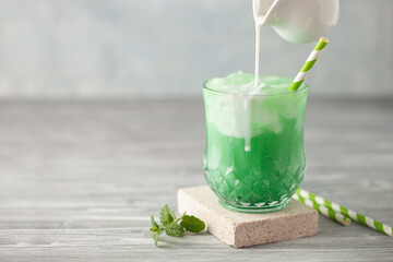 Homemade Cold Dirty Soda with  Coconut Cream and Ice. Trendy Alcohol free mocktail