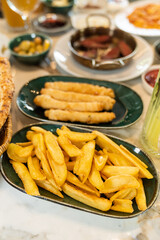 Close up view of french fries on a restaurant table.