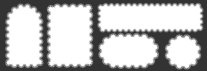 Collection of white lace frames in various shapes. Delicate vintage openwork elements isolated on a gray background.