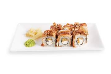 Organic delicious sushi rolls or unagi maki made from eel fish, boiled rice, nori seaweed and cream cheese decorated with bonito flakes served on plate with ginger and wasabi isolated on white
