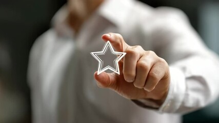 Reaching for Excellence: A hand gently holds a translucent star, symbolizing the pursuit of excellence, high quality, and top performance.
