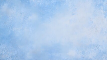 Obraz premium A tranquil minimalist background featuring a soft hazy blue sky with delicate wispy white clouds creating a peaceful contemplative atmosphere