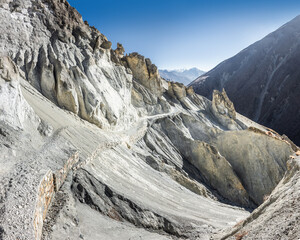 Well-paved and wide trekking route in landslide area near Tilicho base camp. Tilicho trek, a part of the Annapurna circuit in Himalaya mountains, Nepal.