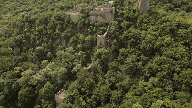 Aerial revealing close up view Ujarma Fortress. Ancient Hilltop Royal Citadel and Strategic Stronghold of the Iberian Kings in Kakheti, Georgia. Sightseeing destination in Kakheti wine region