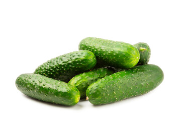 Cucumber isolated on white background. Slice of cucumber on white background. Fresh organic green cucumbers. Vegan. Ingredient for salad. Farm vegetables.