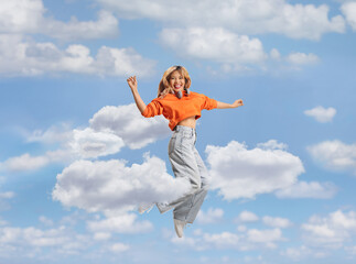 Overjoyed asian woman jumping