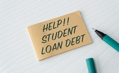 Concept of Help. Student Loan Debt write on paperwork isolated on Wooden Table.