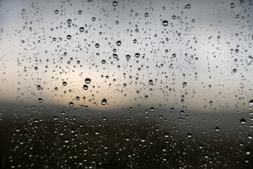 Window with raindrops, traces of rain on the window