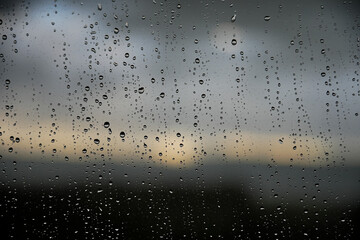 Window with raindrops, traces of rain on the window