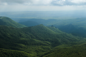 Misty Mountains and Rocky Cliff