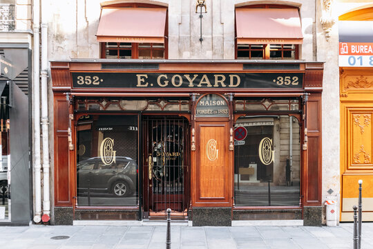 Paris, France - 23 February 2025: Goyard boutique facade on rue Saint Honore, classic wood exterior with gold logo, historic luxury luggage store