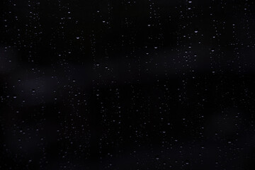 Window with raindrops, traces of rain on the window