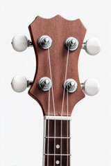 Close up of a ukulele headstock, showcasing its dark brown wood, white tuning pegs, and fretboard.
