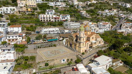 Fototapeta premium Aerial view of the church of San Gennaro in the main square of Praiano. This parish is located in the province of Salerno, Campania, Italy.