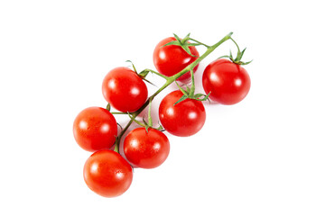 Branch of fresh ripe cherry tomatoes isolated on a white.