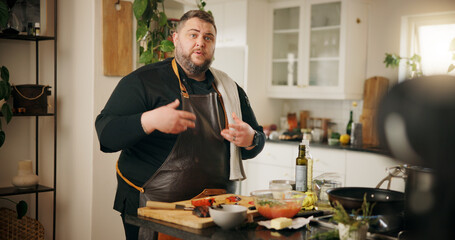Vlog, cooking and man with live streaming in kitchen for dinner menu tutorial, meal prep or video...