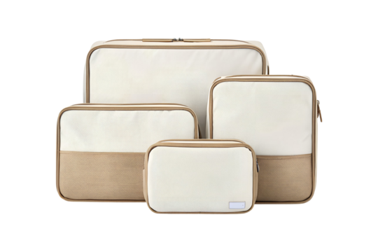 Set of four beige and white cosmetic travel bags against transparent background