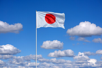 small soft cumulus fair weather clouds in a blue sky